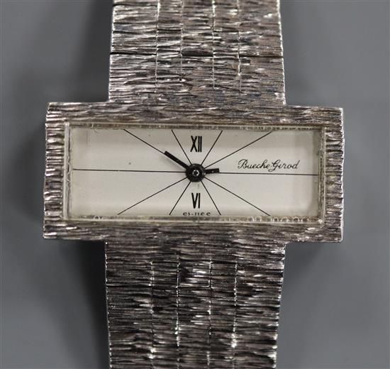 A lady's 9ct white gold Bueche Girod wrist watch with textured 9ct gold integral bracelet.